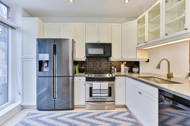 Double Door Refrigerator in a white kitchen